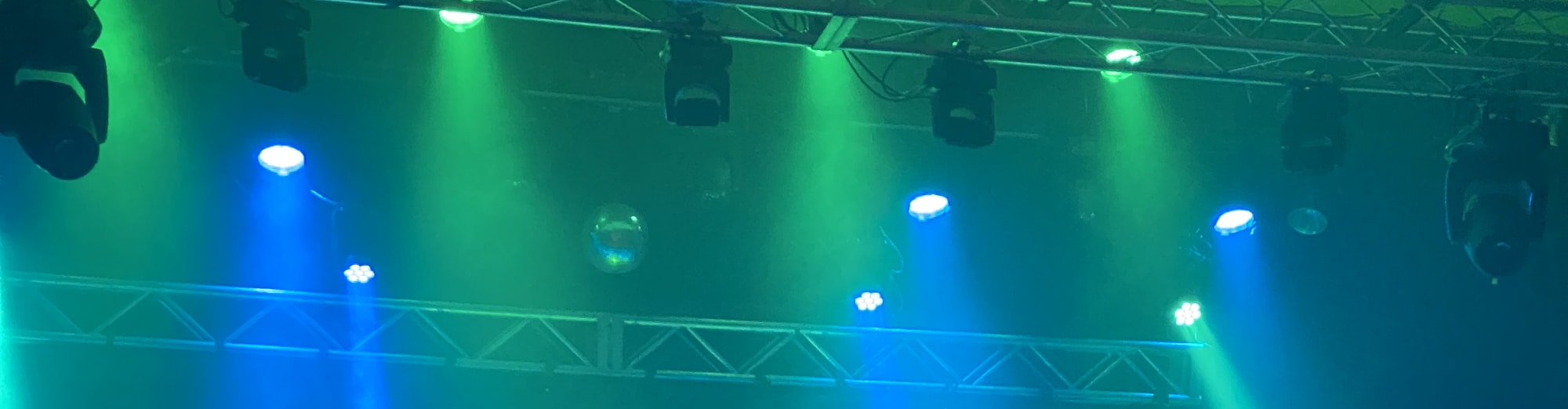 blue and green theater stage lights Denver